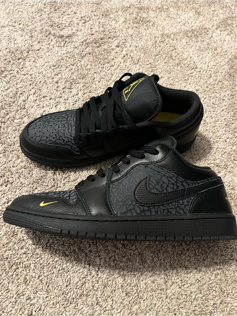 Jordan 1 Black Low-Top Sneakers with Yellow Accents